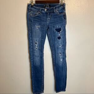 Silver Tuesday Skinny Distressed Jeans